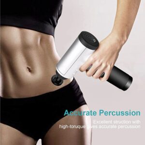 Woman using a handheld percussion massage device on her abdomen.