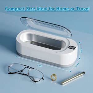 Ultrasonic glasses cleaner with sleek design and accessories.