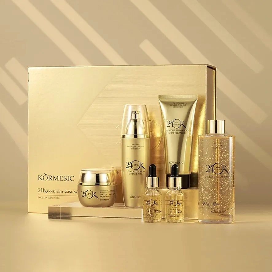 A luxurious skincare set with elegant gold packaging.